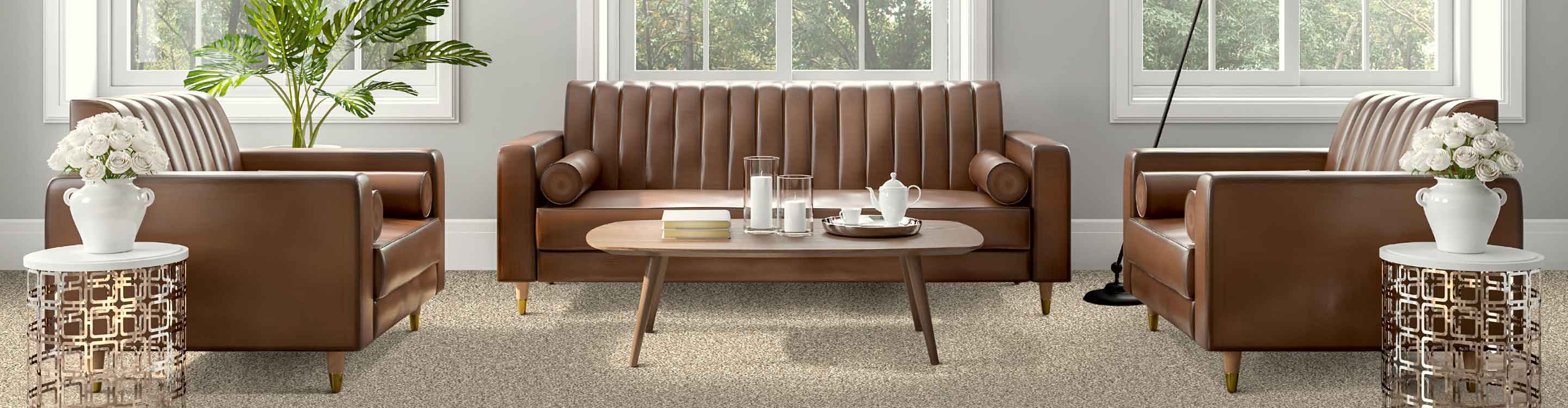light brown carpet in living room with midcentury leather furniture
